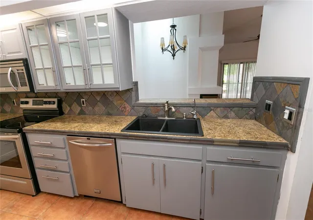 Photo 4 of Townhouse for sale at 640 Elm Crk Ct, Altamonte Springs, FL 32714 | MLS# O6438178 | Listing updated on 2026-09-25