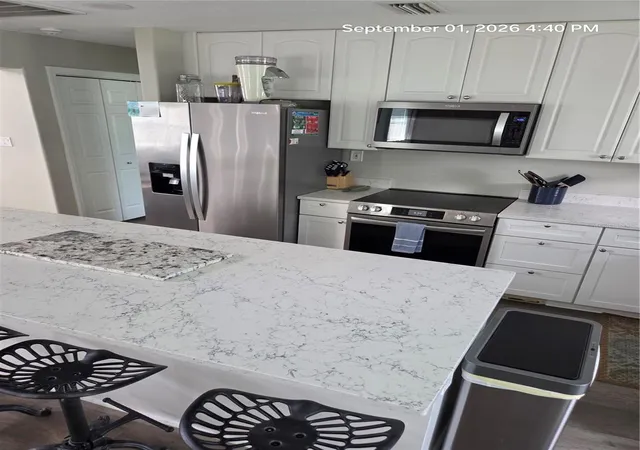 Photo 4 of Single family home for sale at 117 79th Street, Holmes Beach, FL 34217 | MLS# TB8544523 | Listing updated on 2026-09-20