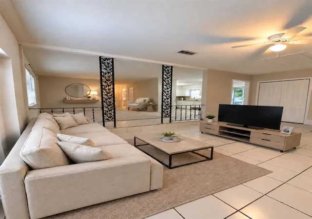 Photo 2 of Single family home for sale at 7927 Arabian Pl, Orlando, FL 32818 | MLS# O6438283 | Listing updated on 2026-09-13