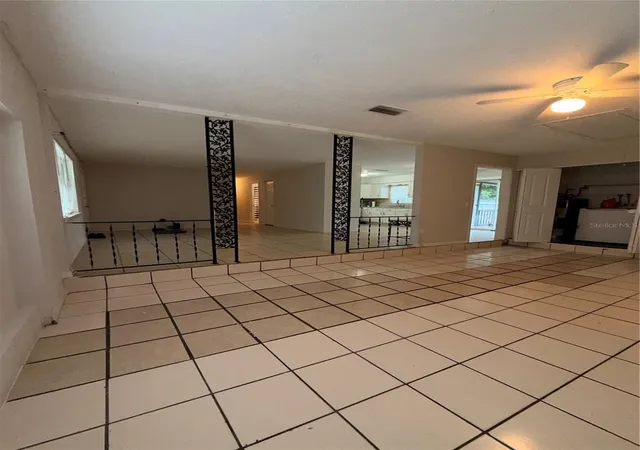 Photo 3 of Single family home for sale at 7927 Arabian Pl, Orlando, FL 32818 | MLS# O6438283 | Listing updated on 2026-09-13