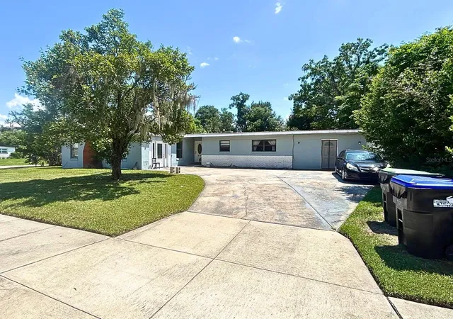 Photo 1 of Single family home for sale at 6233 Oakcrest Cir, Orlando, FL 32808 | MLS# O6438298 | Listing updated on 2026-09-04
