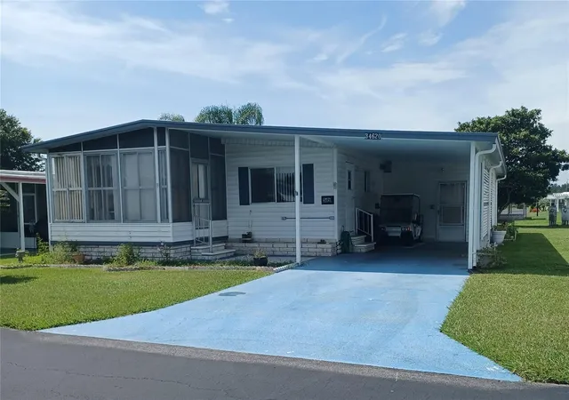 Photo 1 of Manufactured home for sale at 34620 Sweetpea Ln, Zephyrhills, FL 33541 | MLS# TB8544617 | Listing updated on 2026-09-08