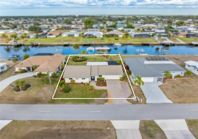 Photo 1 of Single family home for sale at 774 Spring Lake Blvd Nw, Port Charlotte, FL 33952 | MLS# C7530258 | Listing updated on 2026-09-15