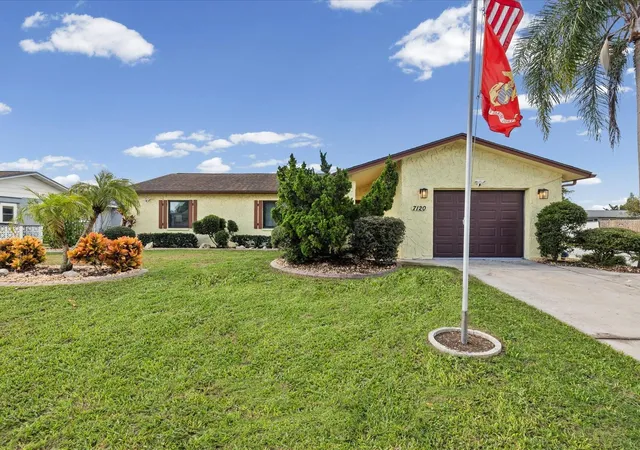 Photo 3 of Single family home for sale at 7120 Coral Reef Dr, Port Richey, FL 34668 | MLS# W7889120 | Listing updated on 2026-09-22