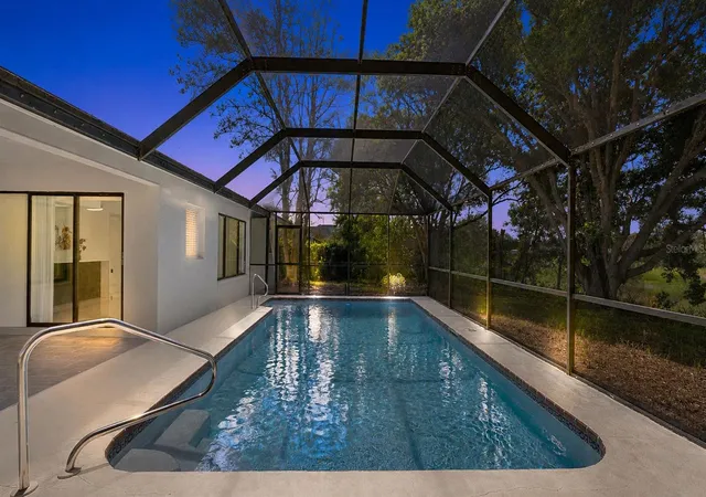 Photo 2 of Single family home for sale at 3017 Bayshore Dr, Spring Hill, FL 34608 | MLS# TB8544650 | Listing updated on 2026-09-15