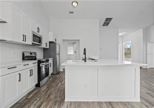 Photo 3 of Single family home for sale at 5427 Blue Tick Dr, Orlando, FL 32810 | MLS# O6438352 | Listing updated on 2026-09-21