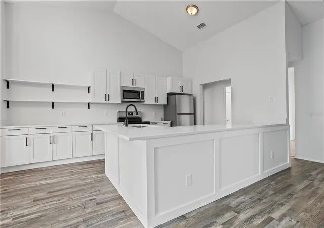 Photo 4 of Single family home for sale at 5427 Blue Tick Dr, Orlando, FL 32810 | MLS# O6438352 | Listing updated on 2026-09-21