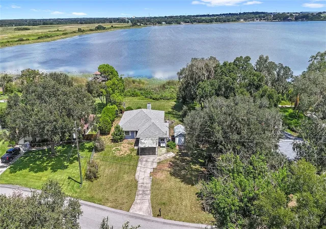 Photo 1 of Single family home for sale at 310 Paradise Is Dr, Haines City, FL 33844 | MLS# O6438355 | Listing updated on 2026-10-05