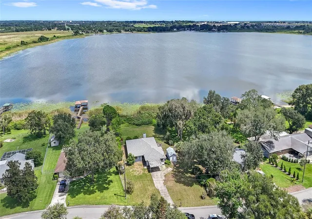 Photo 2 of Single family home for sale at 310 Paradise Is Dr, Haines City, FL 33844 | MLS# O6438355 | Listing updated on 2026-10-05