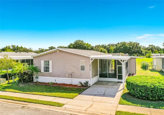 Photo 1 of Manufactured home for sale at 25110 Alamanda Dr, Astatula, FL 34705 | MLS# O6438361 | Listing updated on 2026-09-05