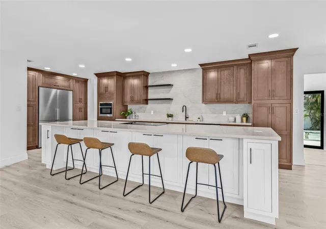 Photo 3 of Single family home for sale at 4495 Clearwater Harbor Dr S, Largo, FL 33770 | MLS# TB8544704 | Listing updated on 2026-09-30
