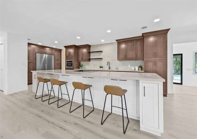 Photo 3 of Single family home for sale at 4495 Clearwater Harbor Dr S, Largo, FL 33770 | MLS# TB8544704 | Listing updated on 2026-09-30