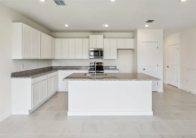 Photo 3 of Single family home for sale at 815 Andrew St, Winter Haven, FL 33881 | MLS# O6438380 | Listing updated on 2026-09-15