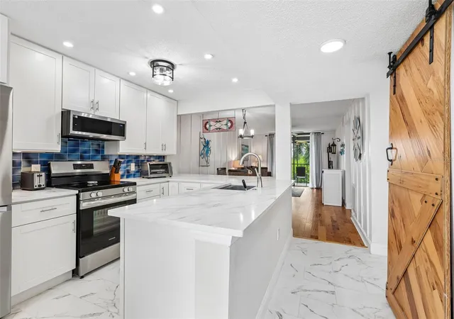 Listing Photo 5 - Condo for sale in building located at 1332 Pasadena Ave S, ST PETERSBURG, FL 33707 - Unit #207