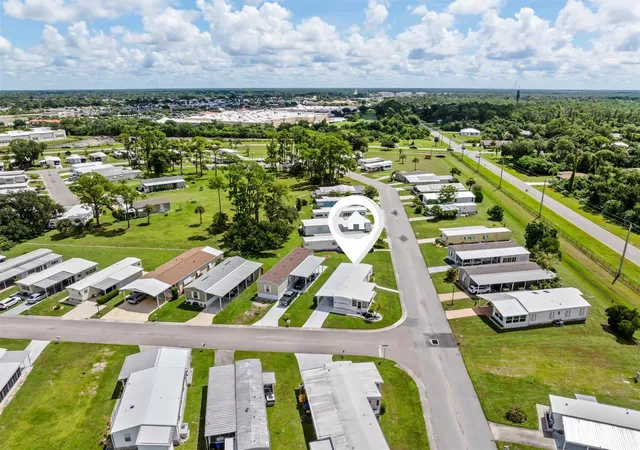 Photo 2 of Manufactured home for sale at 6704 Hoemi Ct, North Port, FL 34287 | MLS# C7530277 | Listing updated on 2026-09-14
