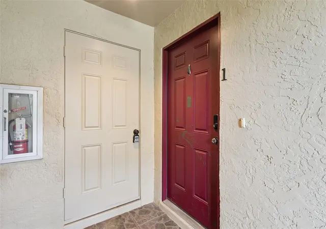 Listing Photo 1 - Condo for sale in building located at 220 Moree Loop, Winter Springs, FL 32708 - Unit #1