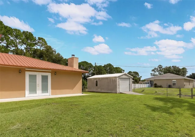 Photo 4 of Single family home for sale at 491 Carpenter Ave NW, Palm Bay, FL 32907 | MLS# O6438585 | Listing updated on 2026-10-16