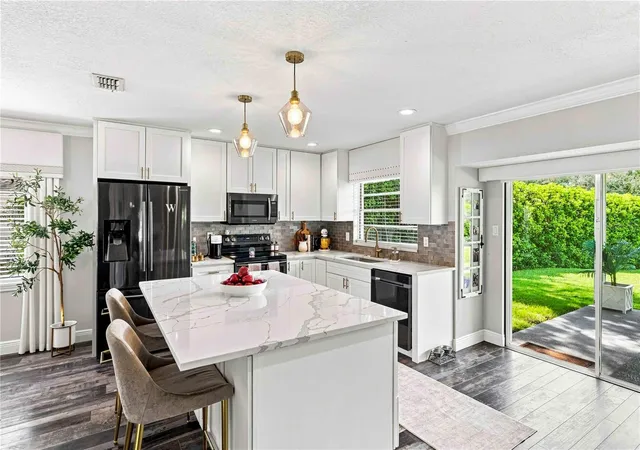 Photo 2 of Single family home for sale at 16642 Vallely Dr, Tampa, FL 33618 | MLS# W7889143 | Listing updated on 2026-09-15