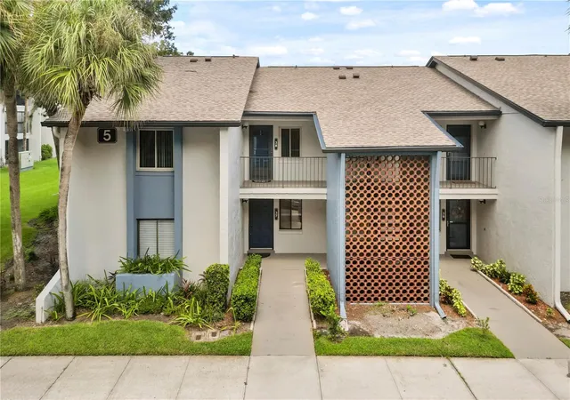 Listing Photo 1 - Condo for sale in building located at 5 Escondido Cir, Altamonte Springs, FL 32701 - Unit #37