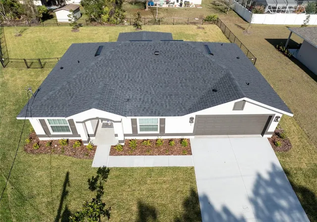Photo 2 of Single family home for sale at 40 Butternut Dr, Palm Coast, FL 32137 | MLS# FC321178 | Listing updated on 2026-10-28