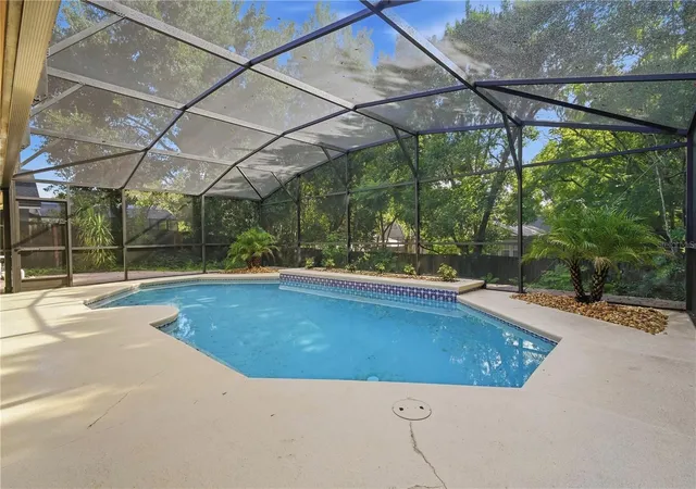 Photo 3 of Single family home for sale at 4425 Winderwood Cir, Orlando, FL 32835 | MLS# O6438658 | Listing updated on 2026-09-20