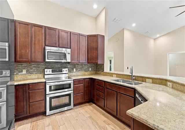 Photo 3 of Single family home for sale at 4425 Winderwood Cir, Orlando, FL 32835 | MLS# O6438658 | Listing updated on 2026-09-18