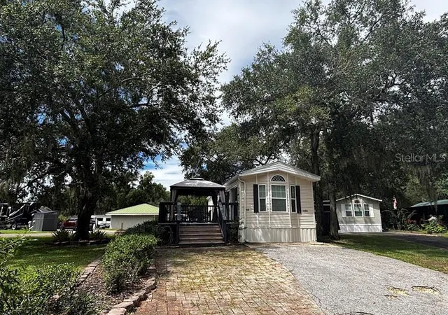 Photo 2 of Manufactured home for sale at 14104 253rd Avenue Rd NE #398, Fort Mc Coy, FL 32134 | MLS# OM731588 | Listing updated on 2026-09-18