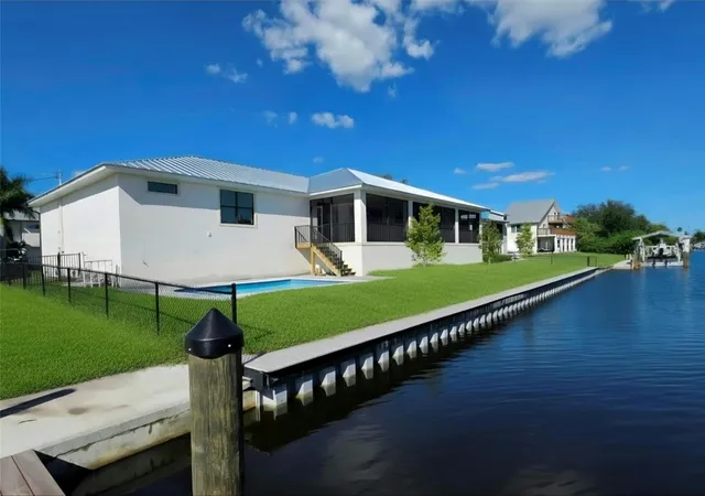 Single family home for sale at 24317 Treasure Is Blvd, PUNTA GORDA, FL 33955 | MLS# C7530301