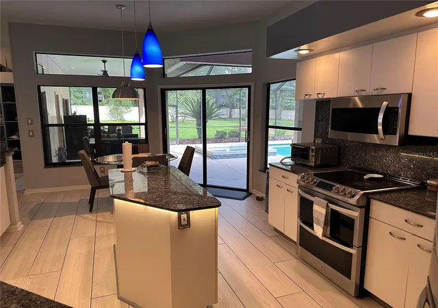Photo 2 of Sale Pending at 8969 Sw 44th Lane, Gainesville, FL 32608 | MLS# TB8545003 | Listing updated on 2026-09-12