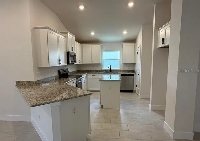Photo 3 of Single family home for sale at 11612 Grace Rd, Weeki Wachee, FL 34614 | MLS# OM731597 | Listing updated on 2026-10-19