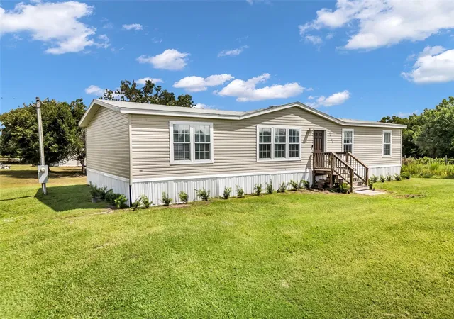 Photo 3 of Manufactured home for sale at 19683 NW 302nd Street, Okeechobee, FL 34972 | MLS# O6438722 | Listing updated on 2026-09-14