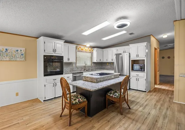 Photo 3 of Manufactured home for sale at 6627 Westchester Dr Ne, Winter Haven, FL 33881 | MLS# S5156843 | Listing updated on 2026-09-05