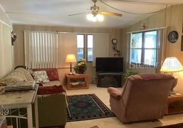 Photo 3 of Manufactured home for sale at 9544 SE 163rd Street, Summerfield, FL 34491 | MLS# OM731613 | Listing updated on 2026-09-05