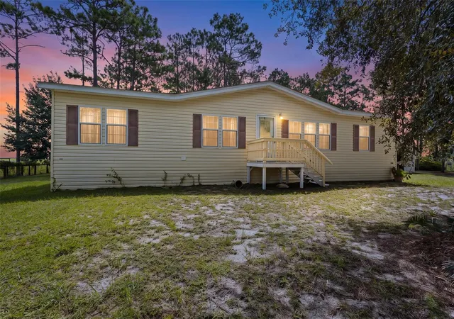 Photo 1 of Manufactured home for sale at 1411 SE State Rd 121, Morriston, FL 32668 | MLS# OM731617 | Listing updated on 2026-09-24