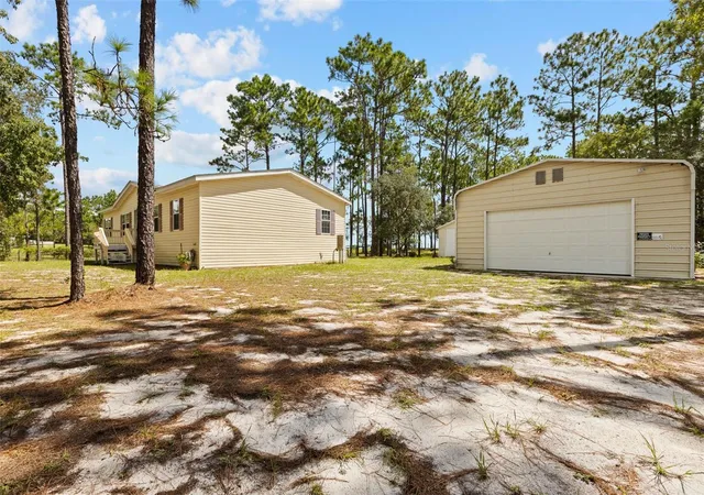 Photo 4 of Manufactured home for sale at 1411 SE State Rd 121, Morriston, FL 32668 | MLS# OM731617 | Listing updated on 2026-09-24