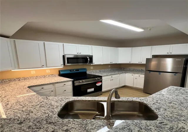 Photo 3 of Condo for sale at 5512 Metrowest Blvd #12-201, Orlando, FL 32811 | MLS# O6438847 | Listing updated on 2026-09-14