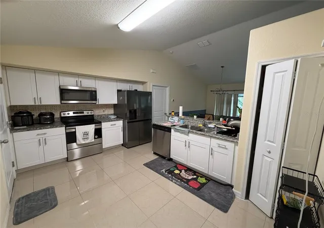 Photo 3 of Single family home for sale at 14220 Spring Hl Dr, Spring Hill, FL 34609 | MLS# TB8545186 | Listing updated on 2026-10-02