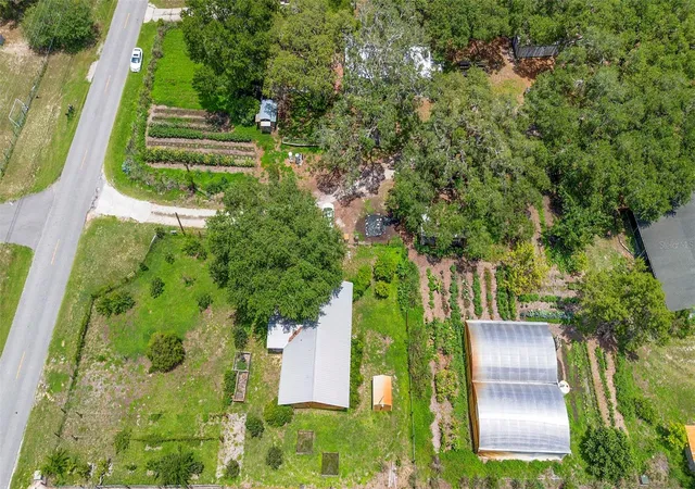 Photo 4 of House for sale at 2016 Lewis Rd, Leesburg, FL 34748 | MLS# O6438858 | Listing updated on 2026-09-28