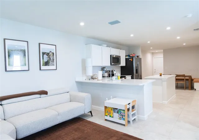 Photo 2 of Townhouse for sale at 11402 Spectacled Dr, New Port Richey, FL 34654 | MLS# O6438896 | Listing updated on 2026-09-19