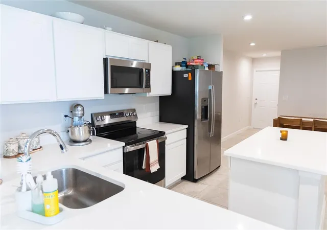 Photo 4 of Townhouse for sale at 11402 Spectacled Dr, New Port Richey, FL 34654 | MLS# O6438896 | Listing updated on 2026-09-19