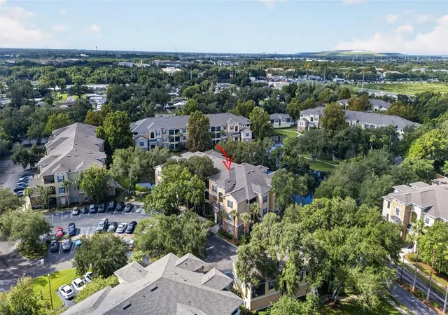 Listing Photo 2 - Condo for sale in building located at 10103 Courtney Oaks Cir, Tampa, FL 33619 - Unit #302