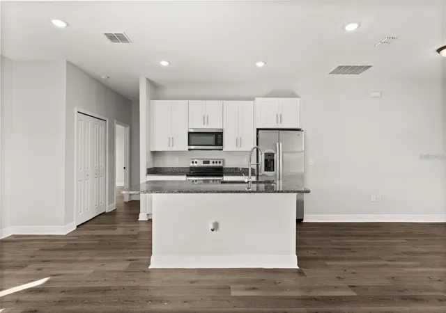 Photo 3 of Single family home for sale at 1125 Munster Ct, Kissimmee, FL 34759 | MLS# O6438920 | Listing updated on 2026-10-12