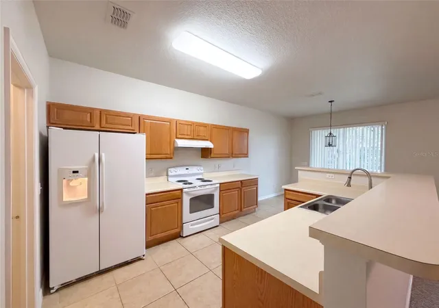 Photo 3 of Single family home for sale at 419 Hammerstone Ave, Haines City, FL 33844 | MLS# O6438929 | Listing updated on 2026-09-17