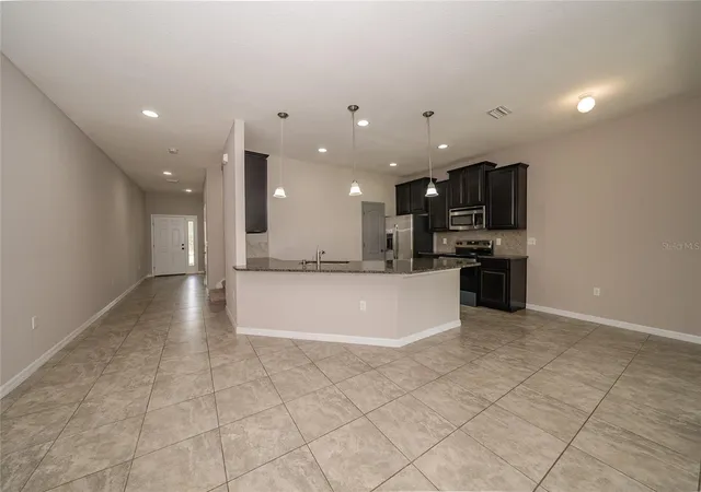 Photo 3 of Townhouse for sale at 26945 Juniper Bay Dr, Wesley Chapel, FL 33544 | MLS# TB8545298 | Listing updated on 2026-09-14