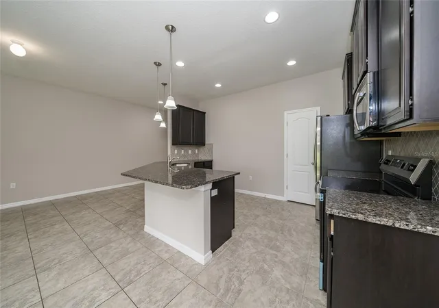 Photo 4 of Townhouse for sale at 26945 Juniper Bay Dr, Wesley Chapel, FL 33544 | MLS# TB8545298 | Listing updated on 2026-09-14
