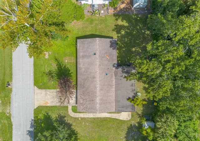 Photo 40 of Single family home for sale at 2629 Umbrella Tree Dr, EDGEWATER, FL 32141 | MLS# NS1089158 | Listing updated on 2026-10-20