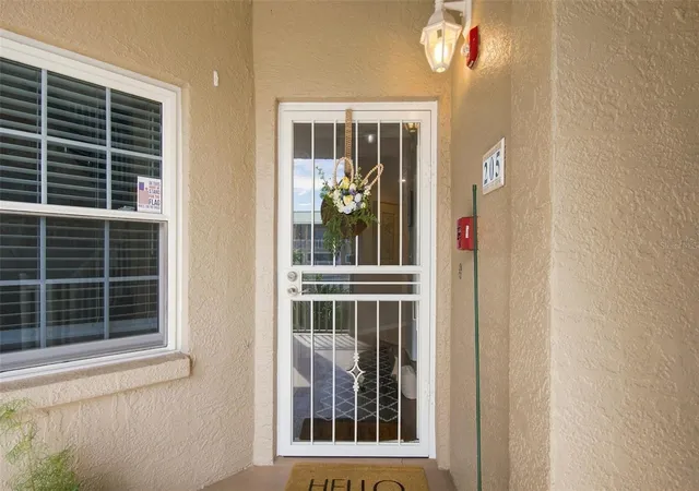 Listing Photo 3 - Condo for sale in building located at 399 150Th Ave, Madeira Beach, FL 33708 - Unit #205