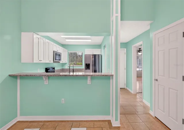 Photo 3 of Single family home for sale at 486 Prestwick Pl, Kissimmee, FL 34759 | MLS# O6438972 | Listing updated on 2026-09-04