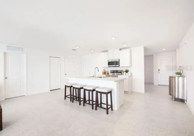Photo 3 of Single family home for sale at 21239 Wynyard Ave, Port Charlotte, FL 33954 | MLS# O6438973 | Listing updated on 2026-09-04