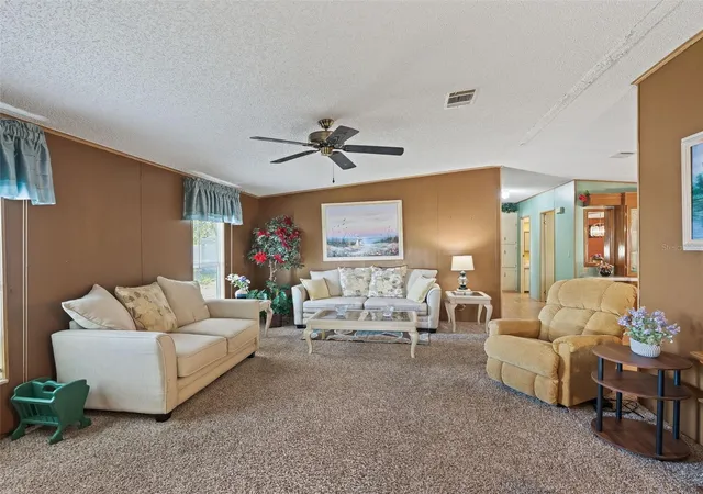 Photo 2 of Manufactured home for sale at 12655 Se 101st Court, Belleview, FL 34420 | MLS# G5117348 | Listing updated on 2026-09-12